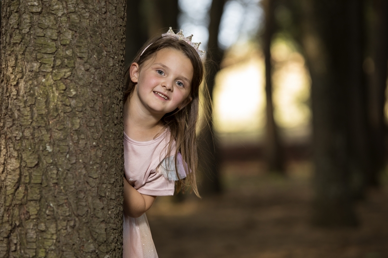 Girl in pine forest