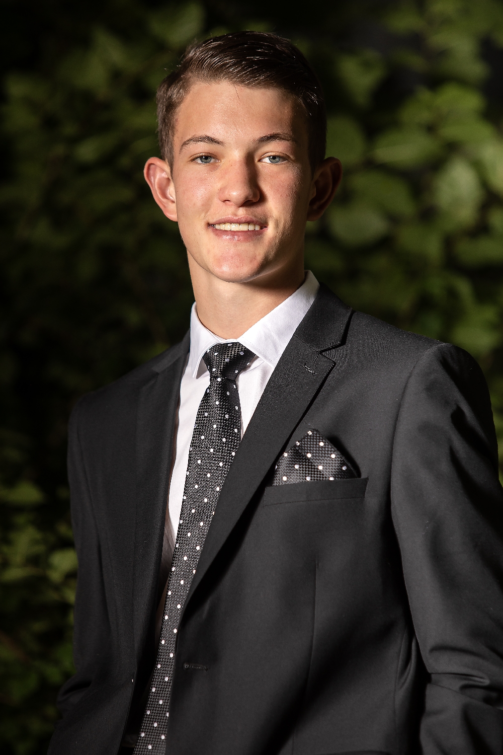 Portrait _ young man in black suit