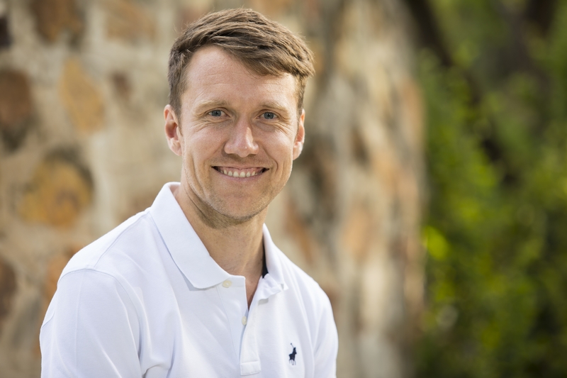 Portrait_man against stone wall
