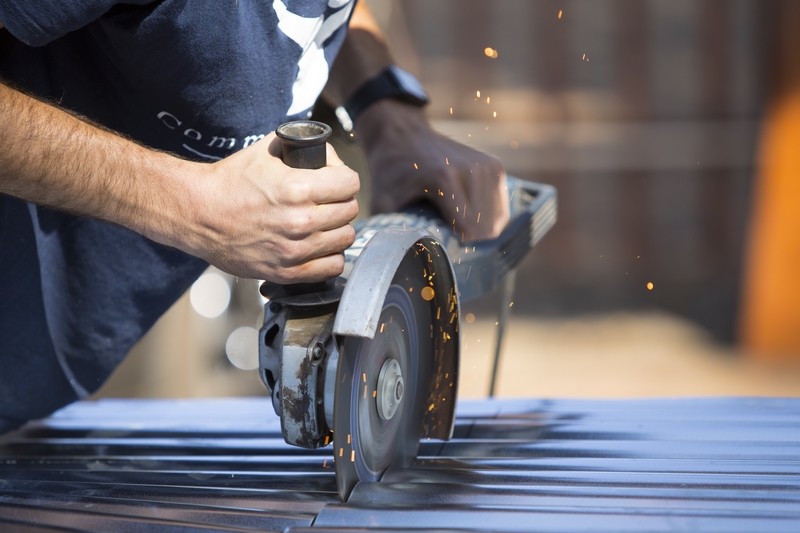 Student grinding at a community based project Student grinding at a community based project